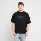 PATIENCE IS A FLEX Unisex Oversized Bio-T-Shirt - Schwarz